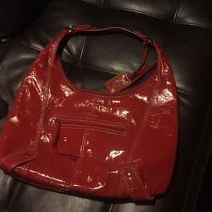 Women's red shiny purse